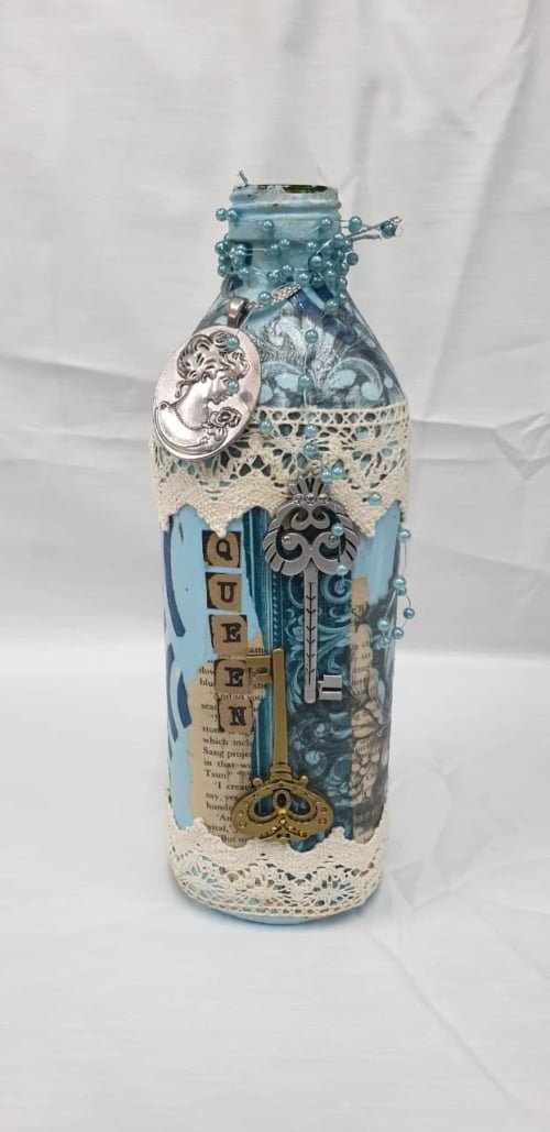 Large bottle blue with keys and trinkets