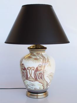 Brown and off white monkey lamp