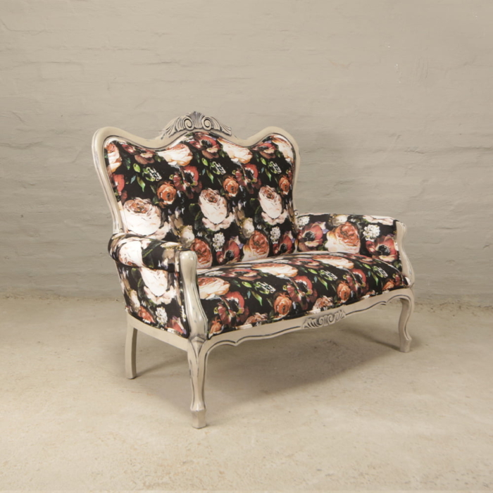 victorian carved sofa with floral velvet