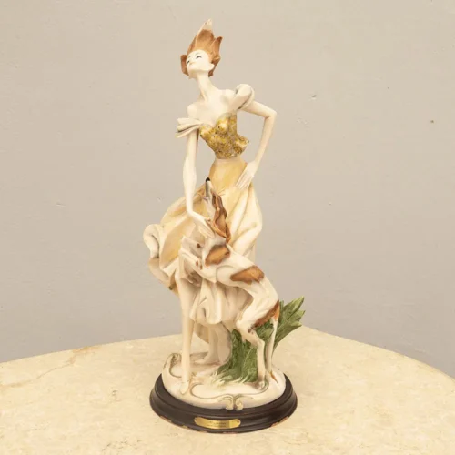 Lady and hound figurine
