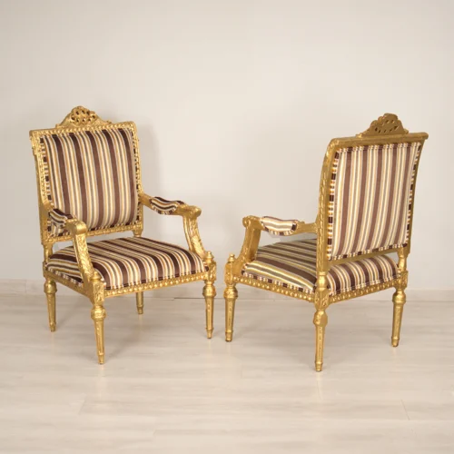 Baroque gilded armchairs